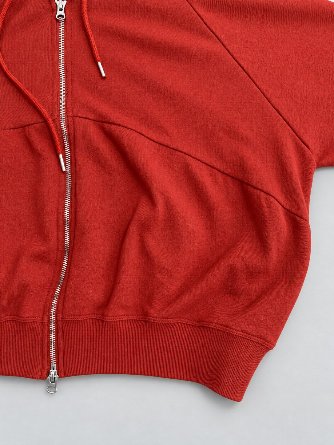 Gathered Zip Hoodie — Gathered panel and hem detail
