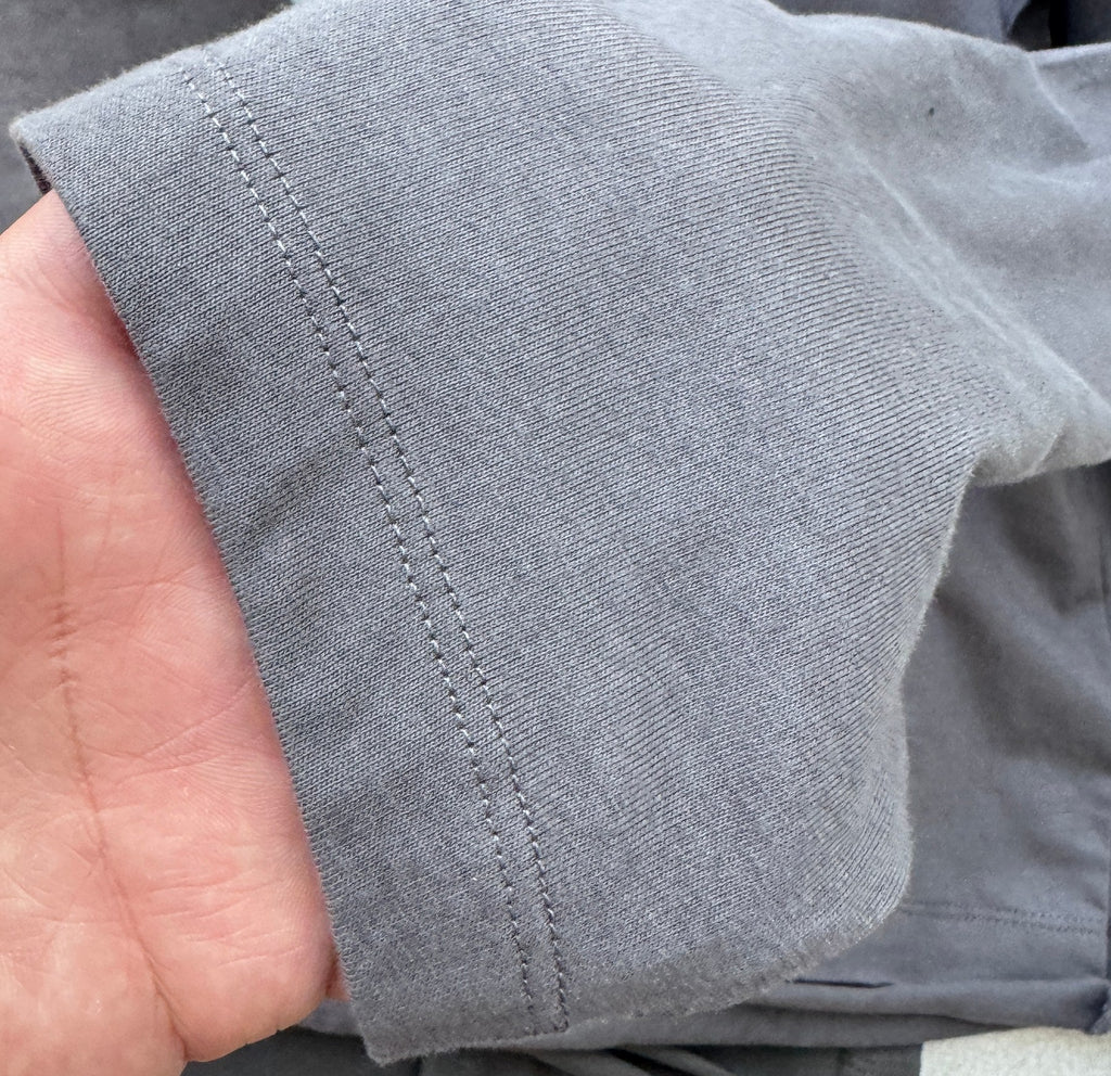 Layered Graphic Tee — Cuff detail