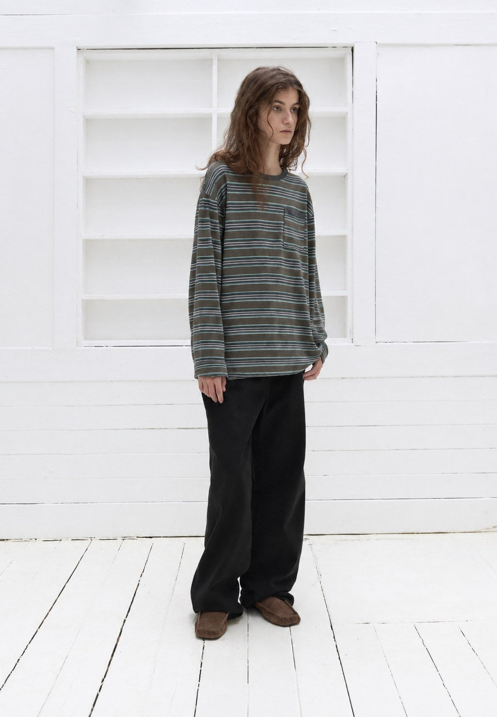 Striped Pocket Tee — Green stripe, three-quarter view