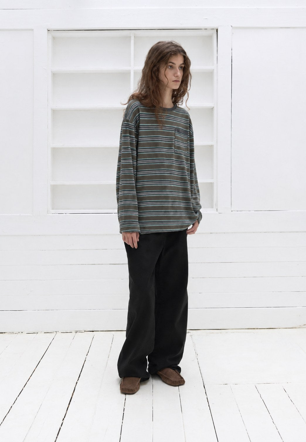 Striped Pocket Tee — Green stripe, three-quarter view
