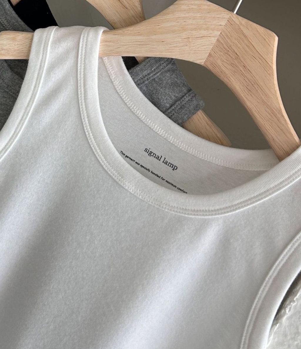 Scoop-Neck Tank in white, photographed neckline detail